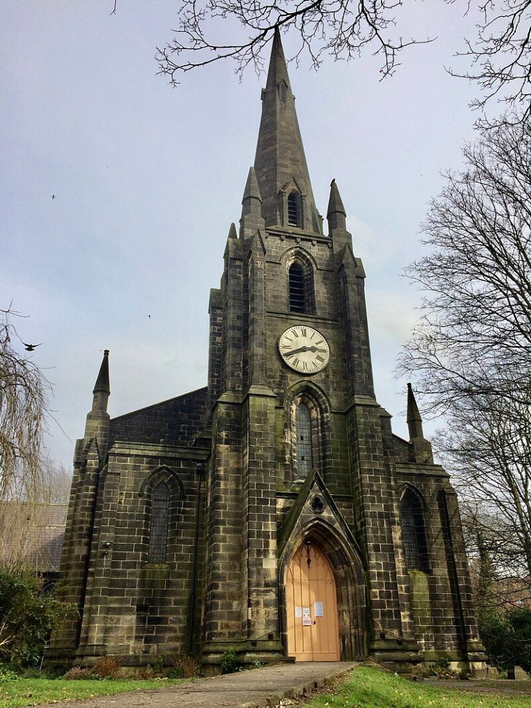 A photo of the entrance to St Stephen's church which has a flat and level concrete path leading to the main door.